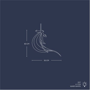 May include: A white metal pendant light fixture with a curved, flowing design. It measures 60 cm in height and 50 cm in width. The light fixture uses an E27 bulb with a wattage of 4-13W and has a warm white light output.