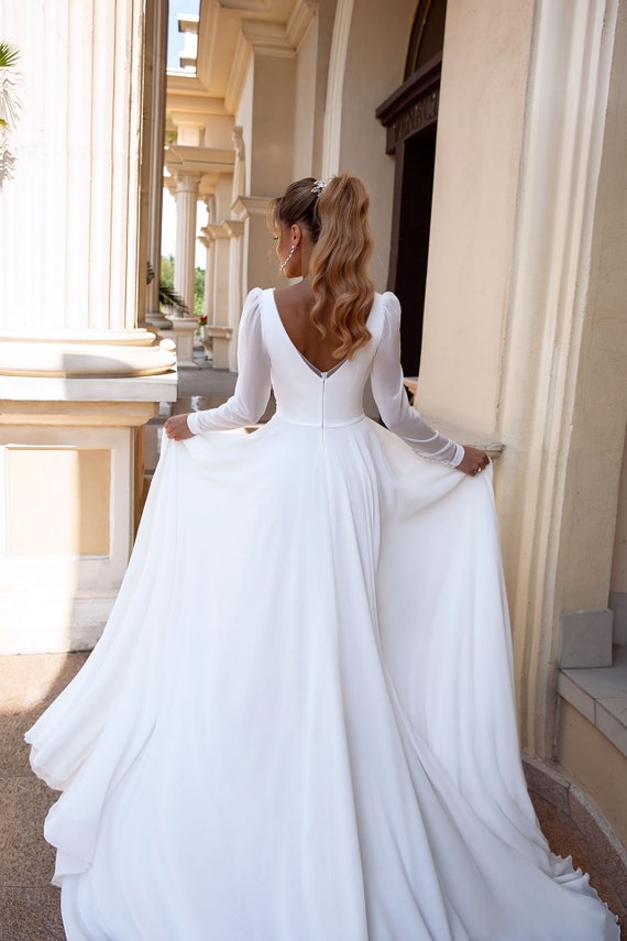 Satin low top back wedding dress