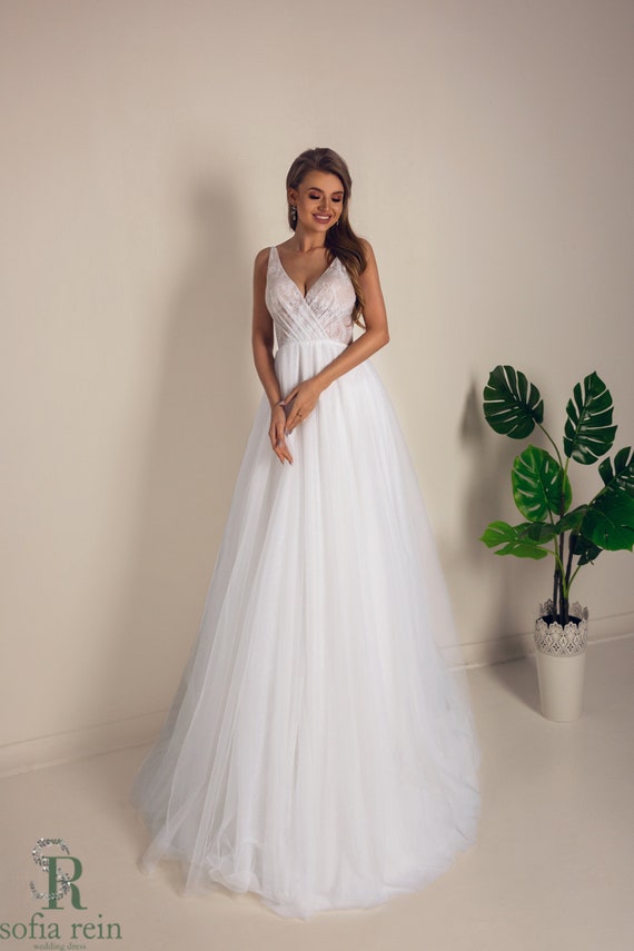 a line wedding dress with tulle skirt