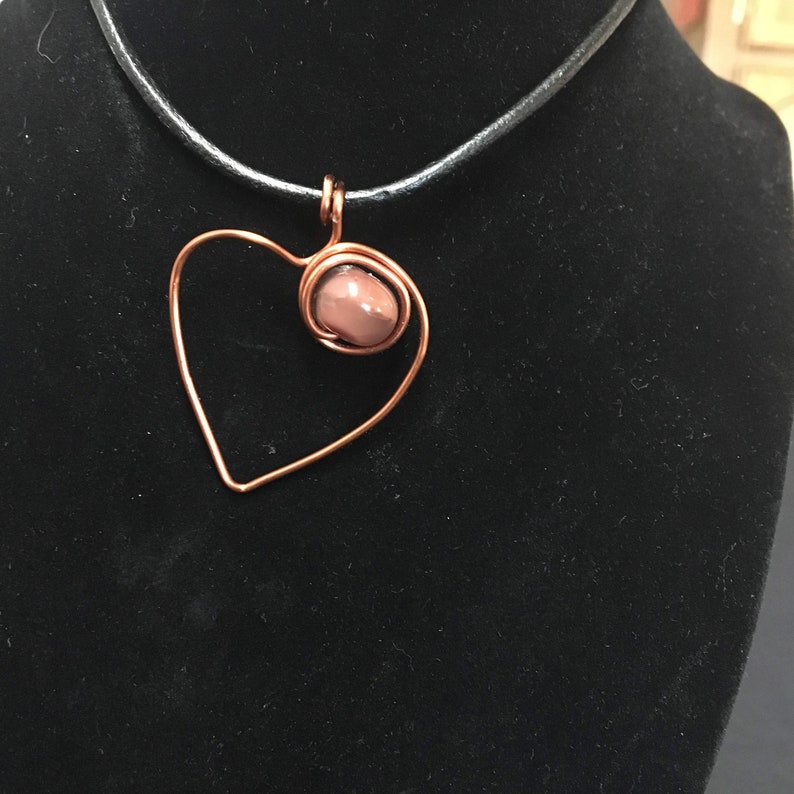 unique glass bead in a custom copper setting The Heart/'s Eye