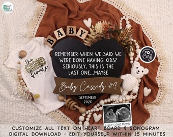 May include: A black heart-shaped chalkboard with the text "Remember when we said we were done having kids? Seriously, this is the last one...maybe" and "Baby Cassidy #4 September 202X". The chalkboard is surrounded by a white crocheted teddy bear, a wooden rattle, a white and brown beaded garland, and a white onesie with the text "The Grand Finale" in gold glitter.
