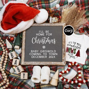 May include: A Christmas-themed baby announcement with a letter board that reads "I'll be home for Christmas. Baby Griswold coming to town December 202X". The letter board is surrounded by a red and green plaid blanket, a Santa hat, wooden blocks spelling "BABY", a small Christmas tree, and a white onesie with the text "It's the most wonderful news of the year" and a red and green plaid Christmas tree.