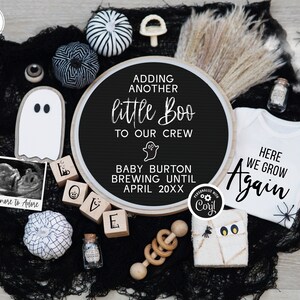 May include: A black and white Halloween themed baby announcement with a chalkboard sign that reads "Adding another little Boo to our crew Baby Burton brewing until April 20XX". There is a white onesie that reads "Here we grow again".