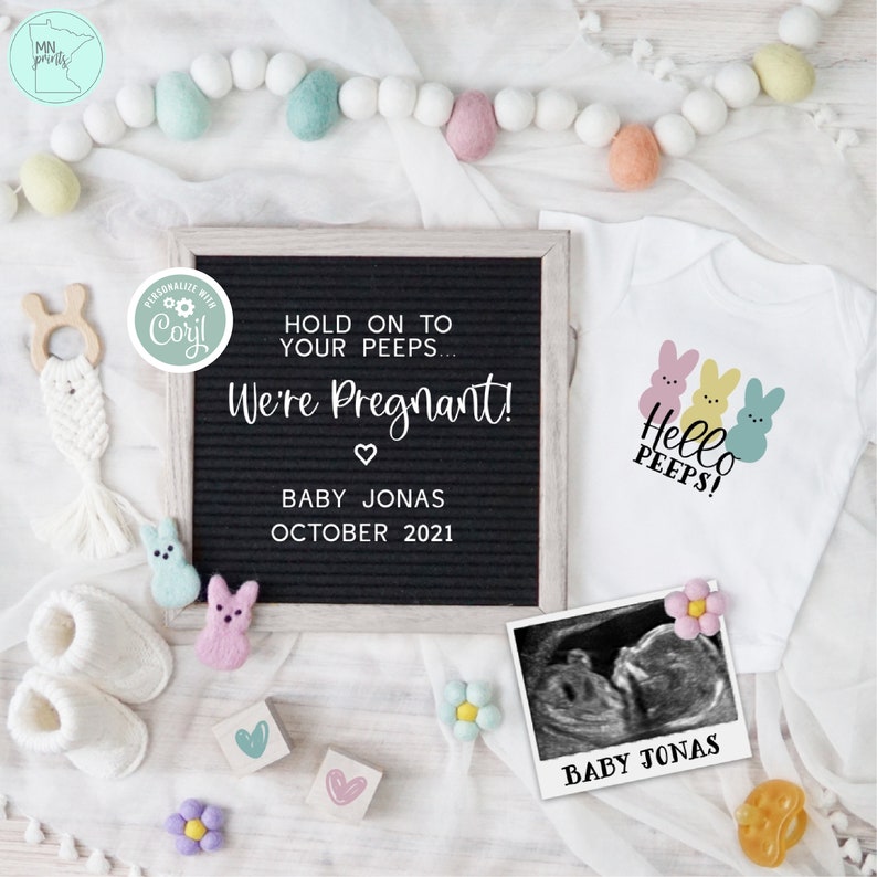 May include: A black letter board with the text "Hold on to your peeps... We're Pregnant!" with a heart symbol, "Baby Jonas" and "October 2021". A white onesie with the text "Hello Peeps!" and three pastel-colored Peeps candies. A black and white ultrasound image with the text "Baby Jonas".