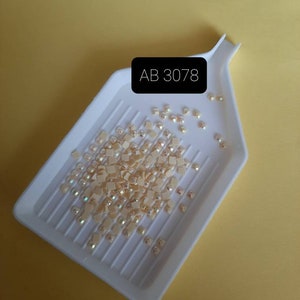 Aurora borealis rhinestone (AB) DMC 3078, for diamond painting, diamond embroidery. SQUARE