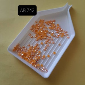 Aurora Borealis (AB) DMC 742 rhinestones for diamond painting, diamond embroidery. SQUARE