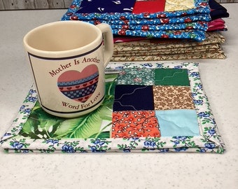 Quilted coffee mug rugs, with place for snack. Multi colored spring mug rugs.