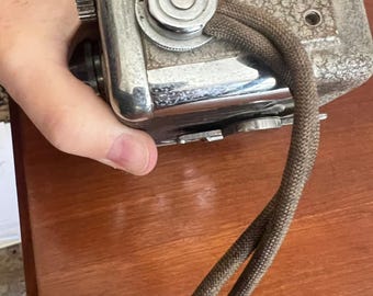 Vintage Revere Eight Model B-61 8 mm movie camera from 1950s