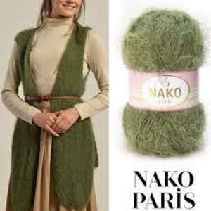 May include: A skein of green yarn with a fuzzy texture. The yarn is labeled "NAKO PARIS" and is packaged in a pink and white box.