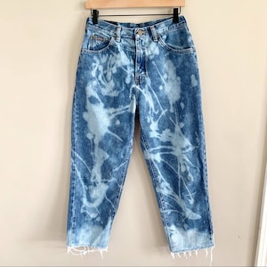Riders • vintage high rise tapered bleached distressed jeans