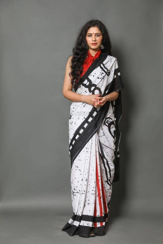 white cotton saree with black border
