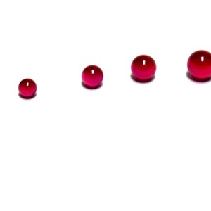 Gema sintética de rubi AAA, formato cabochão redondo, criada em laboratório (1,5 mm - 2,5 mm)