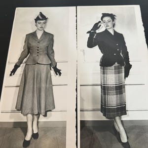May include: Two black and white photographs showing outfits. The left image features a solid-colored jacket with a matching flared skirt, gloves, and a small hat. The right image displays a dark jacket with a plaid skirt and dark gloves.