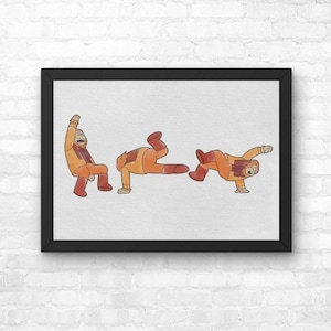 May include: Framed print featuring a cartoon figure in three poses: standing with arm raised, lying down, and doing a handstand. The figure wears an orange jumpsuit, red boots, and a scarf. The artwork is set against a white background.