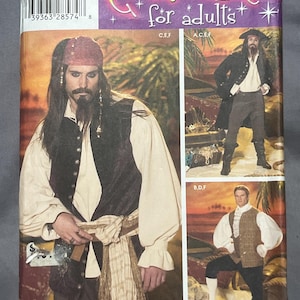 May include: A Simplicity 4923 sewing pattern envelope for adult costumes. The front displays illustrations of pirate-themed outfits including a vest, shirt, and sash. Text includes 'Simplicity', 'Costumes for adults', '4923', and 'Andrea Schewe'.