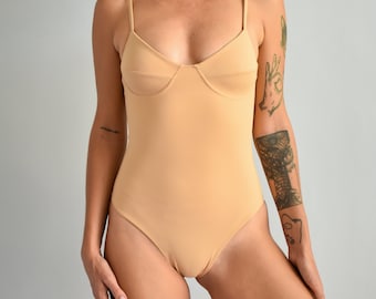 Recycled nylon bustier bodysuit, beige color thong cut swimsuit in econyl regenerated nylon