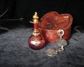 Vintage Glass Filifgee Perfume Bottle With Glass Stopper , Gut glass desigh with gold leaves, Cranberry and Gold , Egyptian Mouth Blown