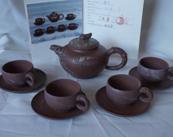 Chinese pottery YiXing ZiSha Pottery set Teapot 4 caps and 4 saucers with artist certificate of authenticity