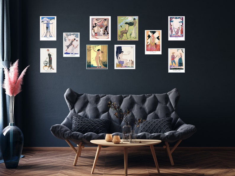 May include: A wall gallery of framed vintage art prints featuring various scenes and figures in a minimalist style. The prints are arranged in a grid pattern on a dark blue wall.