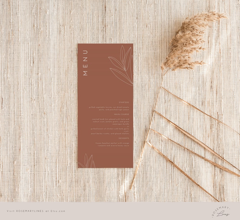 May include: A brown menu card with a white line drawing of a leaf. The menu card has the word "MENU" in white text at the top and lists "STARTERS", "MAIN COURSE", and "DESSERTS".