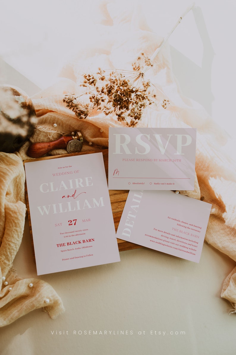 May include: A wedding stationery set in pale pink, including an invitation, RSVP card, and details card. The invitation features the names Claire and William, the date, and venue details. The design is elegant.