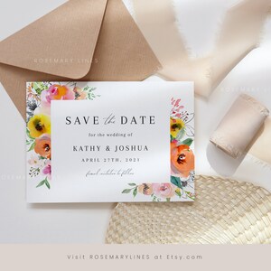 May include: Save the date card with a watercolour floral border. The card says "Save the Date" for the wedding of Kathy & Joshua, April 27th, 2021. Formal invitation to follow.