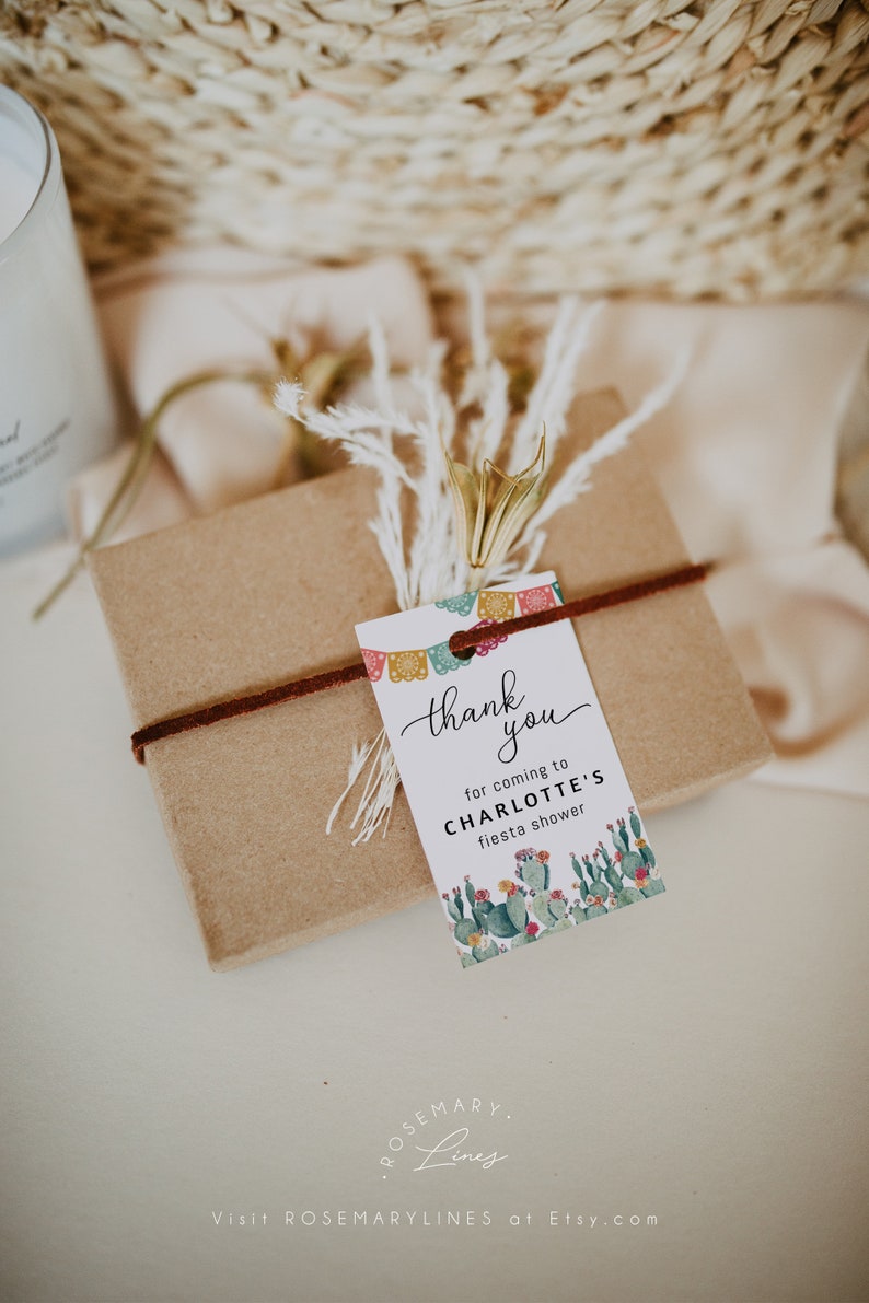 May include: A thank you tag with a cactus and floral design. The tag says "Thank you for coming to Charlotte's Fiesta Shower".