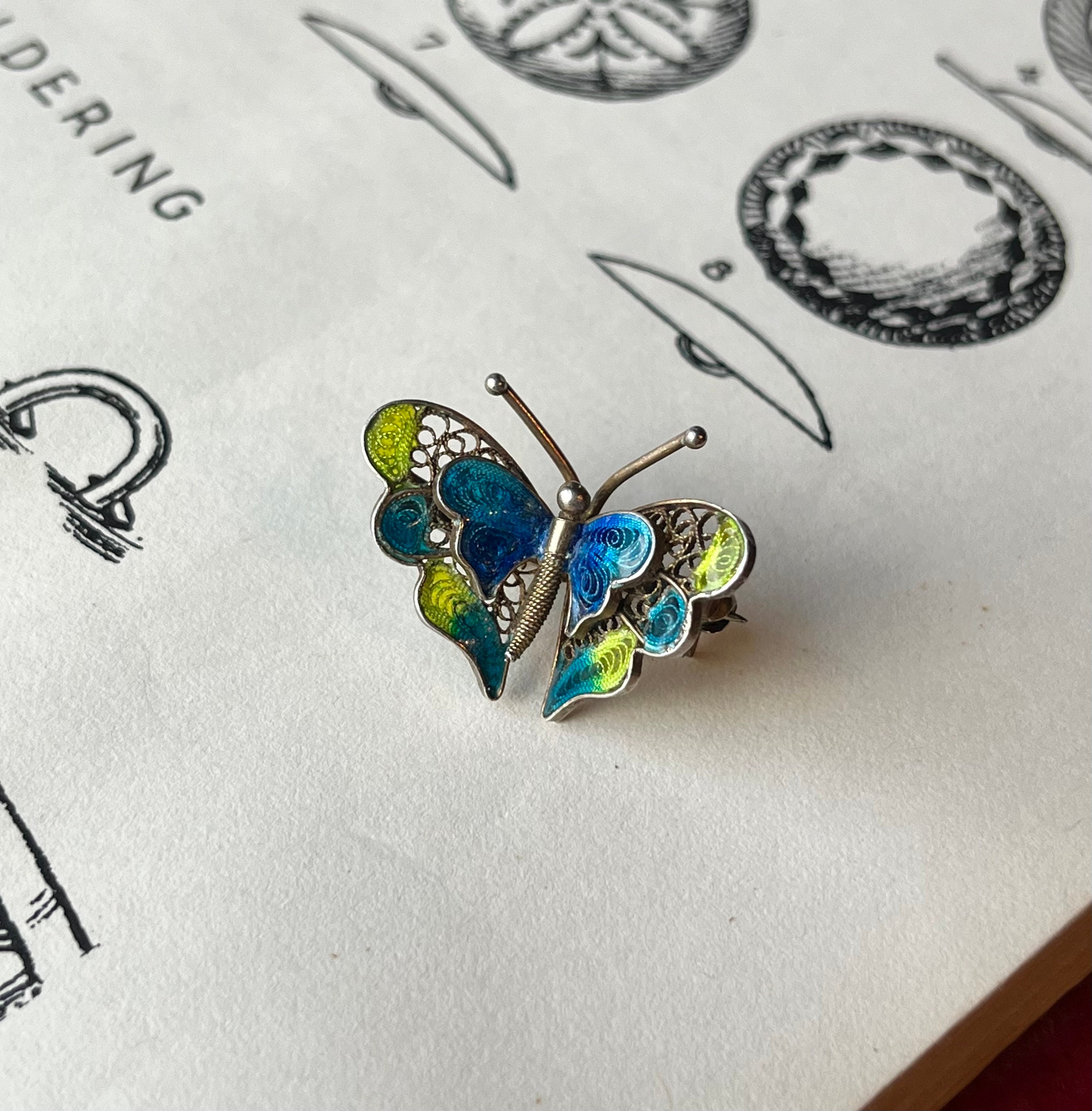 Broche en argent 835 papillon en filigrane et marcassites Argenté Argent /Pierre