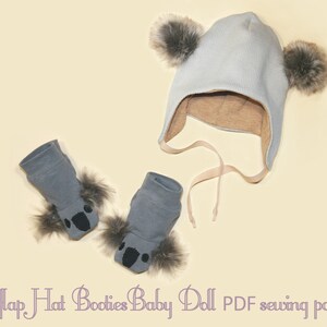 May include: A PDF sewing pattern for a baby doll outfit, including a gray hat with ear flaps and fur pom-poms, and matching gray booties with fur trim and koala paw prints.  The pattern is called "Earflap Hat Booties Baby Doll PDF sewing pattern".