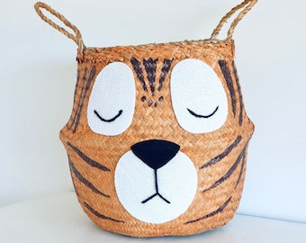 Large tiger seagrass belly basket, had made with an adorable face. Perfect for a safari or jungle themed kids room