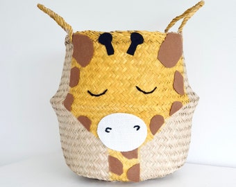 Large giraffe seagrass belly basket with a hand painted and embroidered face. In a yellow mustard colour