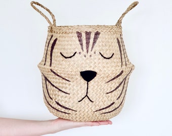Large natural tiger seagrass belly basket, had painted and embroidered with adorable face. Perfect for a safari or jungle themed kids room