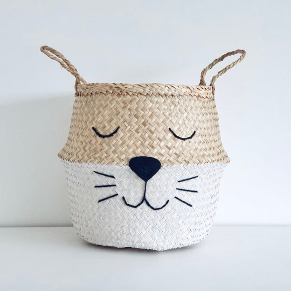 Large seagrass belly basket -With a painted white bottom and adorable animal face with whiskers. Perfect as a toy storage basket