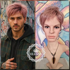 May include: A short, pink wig with a textured, tousled style. The wig is displayed on a mannequin head with a necklace. The image also shows a person with the same pink hairstyle, wearing a dark green plaid jacket.