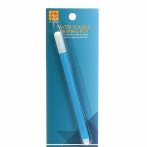 May include: A blue water-soluble marking pen with a white tip. The pen is packaged in a clear plastic sleeve with a blue and white background. The packaging has the text "Water-Soluble Marking Pen" printed on it.