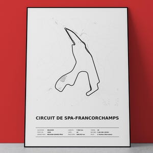 May include: A white poster featuring a black line drawing of the Circuit de Spa-Francorchamps race track. The text reads CIRCUIT DE SPA-FRANCORCHAMPS, followed by details including location, first GP, length, laps, race distance, turns, record, and pilot.