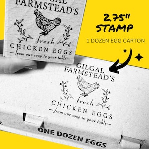 May include: A black and white rubber stamp with the text "Gilgal Farmstead's Fresh Chicken Eggs - from our coop to your table" and a black and white illustration of a chicken. The stamp is 2.75 inches in diameter and is designed for use on egg cartons.