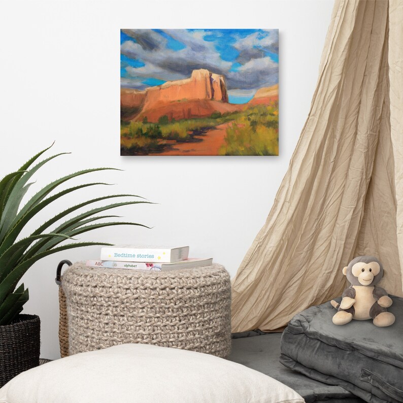 May include: A painting of a red rock formation with a blue sky and white clouds in the background. The painting is in a modern style and has a warm color palette.