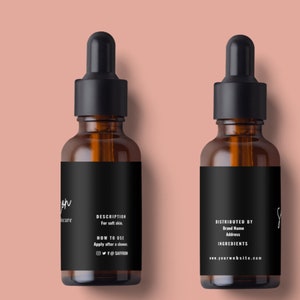 May include: Two amber glass skincare bottles with black droppers and labels. The labels include the brand name, description, how to use, and website address. The bottles are set against a peach background.