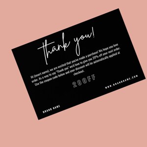 May include: A black thank you card with white script that reads "Thank you!" and a message offering a discount. The card also includes the coupon code "20OFF" and the website address "www.BRANDNAME.COM".