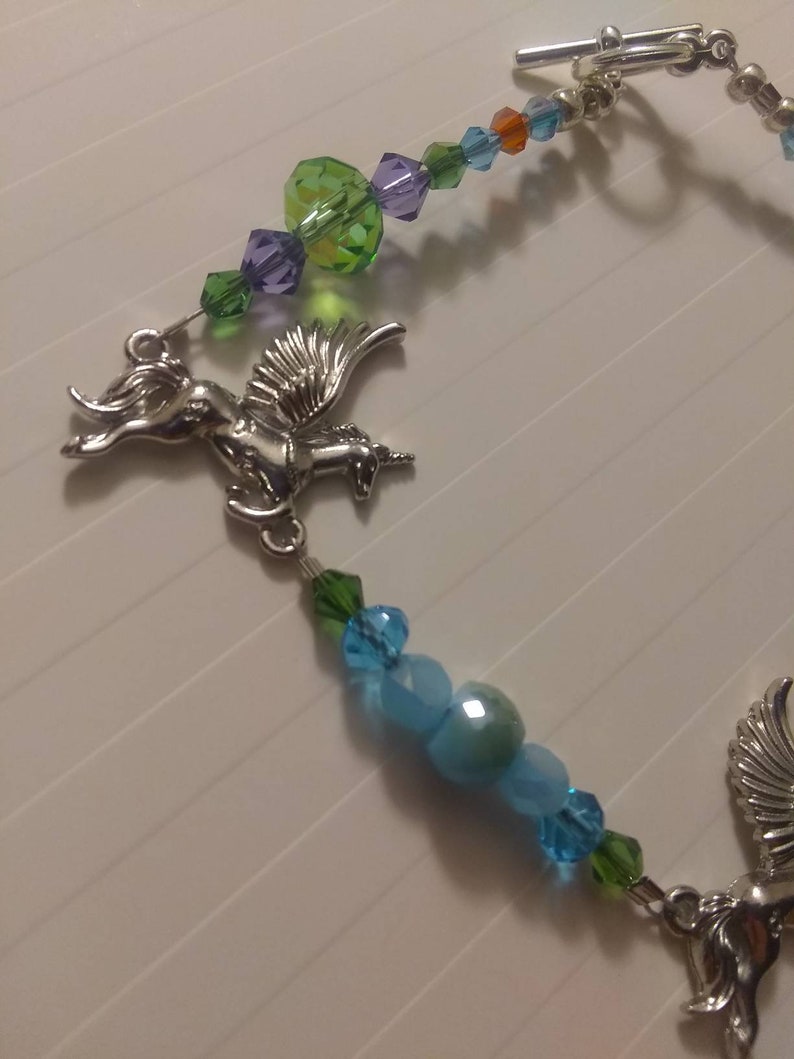 When Horses Had Wings unicorn anklet with multi-colored crystal beads