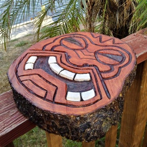 Wall tiki God from large pine slice