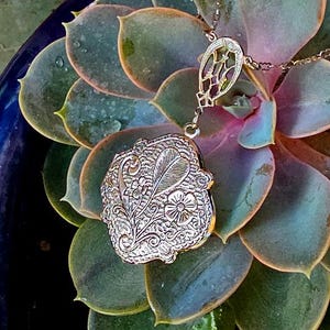 Floral Silver Tone Locket Necklace