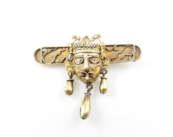 Op inca of Maya geïnspireerde maskerbroche van 10k sterling