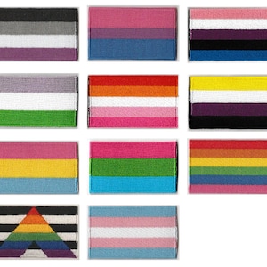 May include: A set of 10 embroidered patches featuring various pride flags, including the transgender, lesbian, gay, bisexual, pansexual, asexual, genderqueer, and intersex flags.