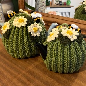 Hand Knitted Pistachio Green Tea Cosy with Cream Flowers and Bees in 2 Sizes