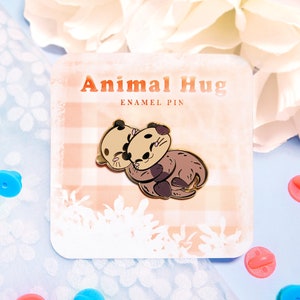Sea Otter Hug Enamel Pin, cute pin board filler, otter hard enamel pin, kawaii cuddling animal art, Gift for her, backpack accessory decor
