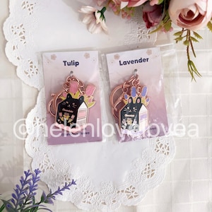Épingle en or rose en carton de lait