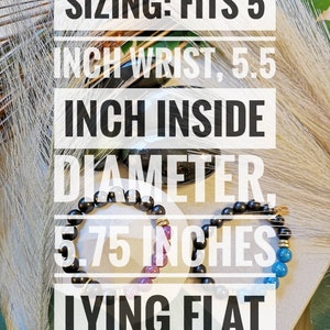 May include: Black beaded bracelet with gold accents. Sizing information: Fits 5 inch wrist, 5.5 inch inside diameter, 5.75 inches lying flat.