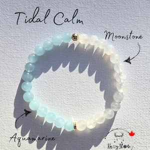 May include: A bracelet with aquamarine and moonstone beads. The bracelet is labeled "Tidal Calm" and the beads are labeled "Aquamarine" and "Moonstone".